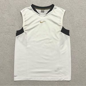 Vintage Nike tank - embroidered logo/swoosh, gray tag

crazy graphic on back